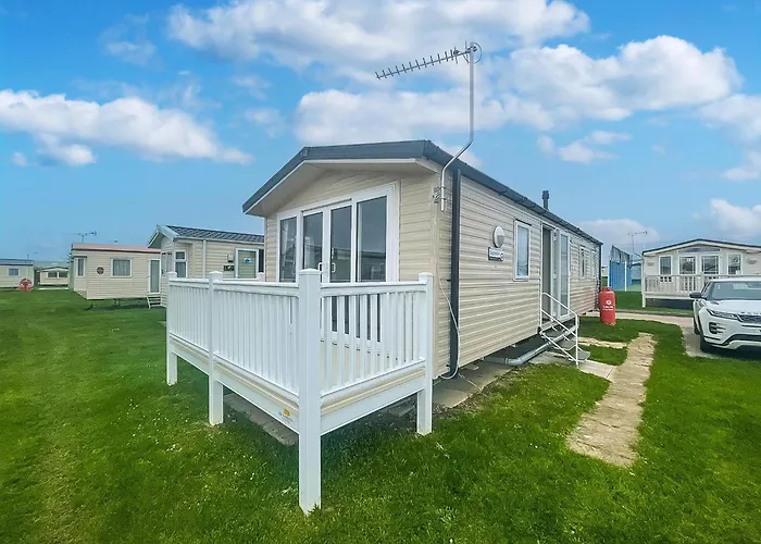 Lovely Caravan With Decking On California Cliffs Holiday Park Ref 50045C