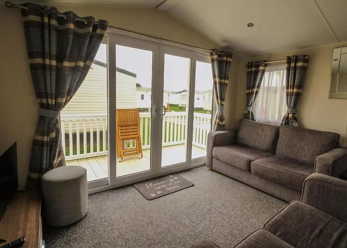 Lovely Caravan With Decking On California Cliffs Holiday Park Ref 50045C